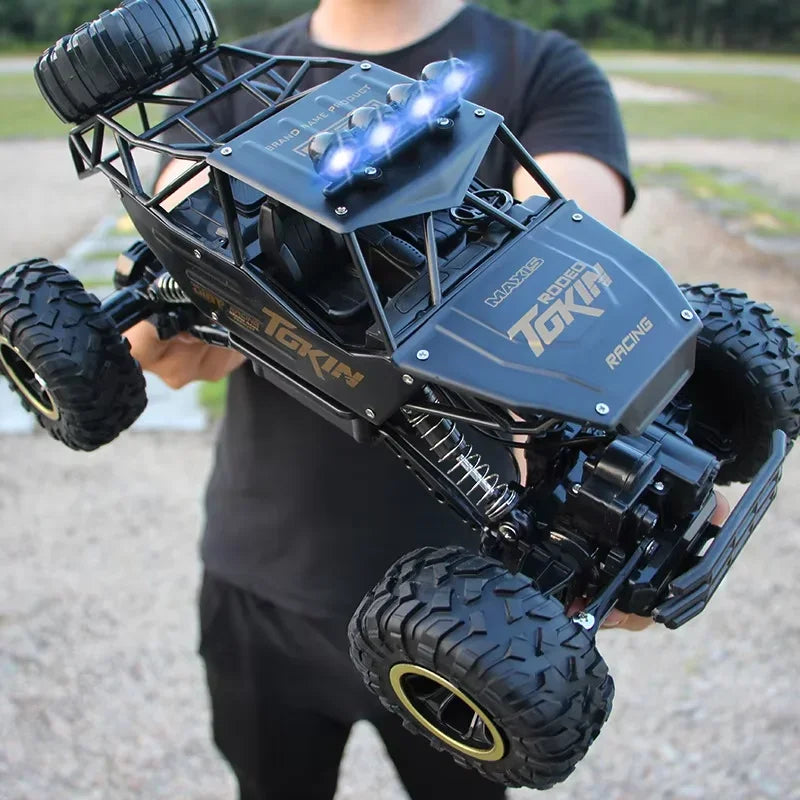 Monster Truck Télécommandé 1:12 – Voiture RC 4x4 Tout-Terrain 37 cm avec Suspension Antichoc